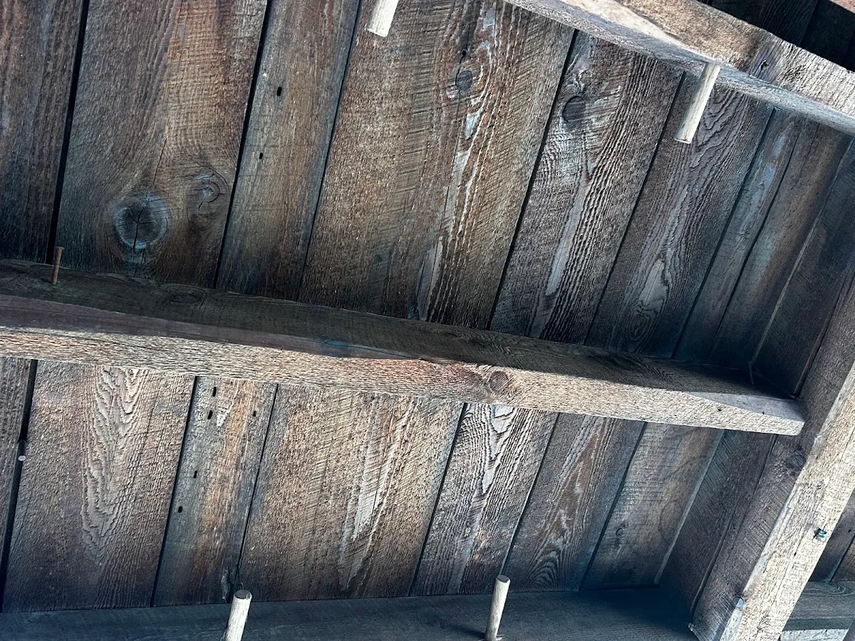 Close view of the grain and patina on reclaimed brown boards