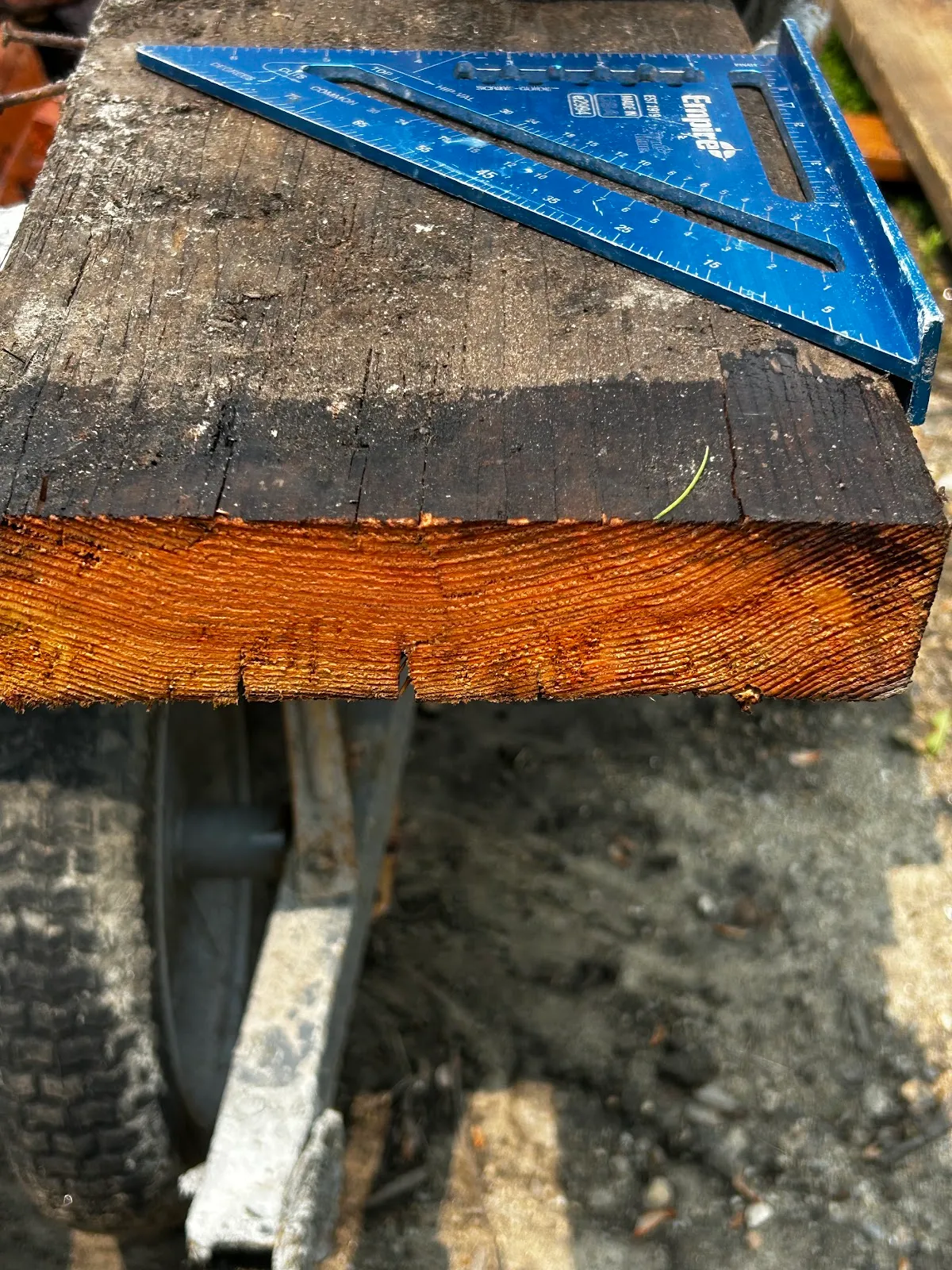 Reclaimed decking board with its weathered face visible