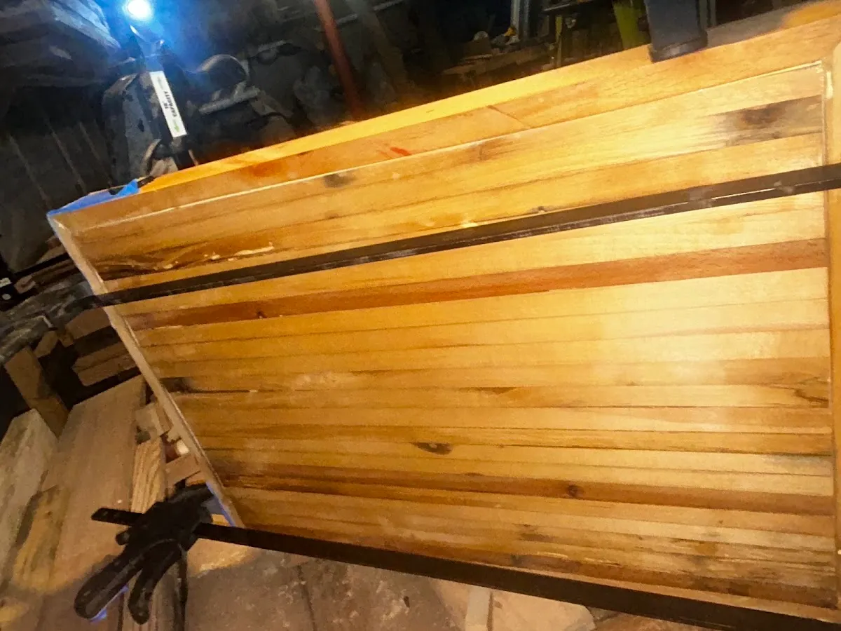 The same flooring before milling, grey and worn.