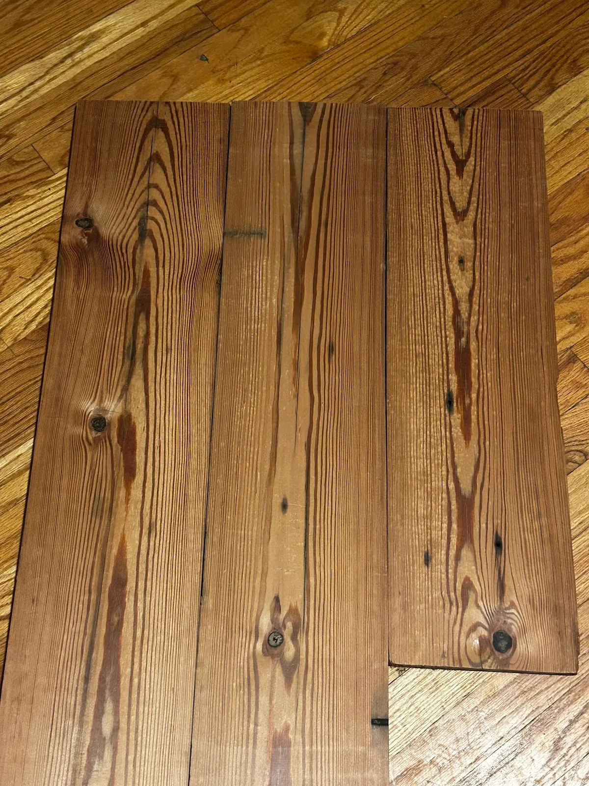 Reclaimed sample boards with warm brown grain arranged together
