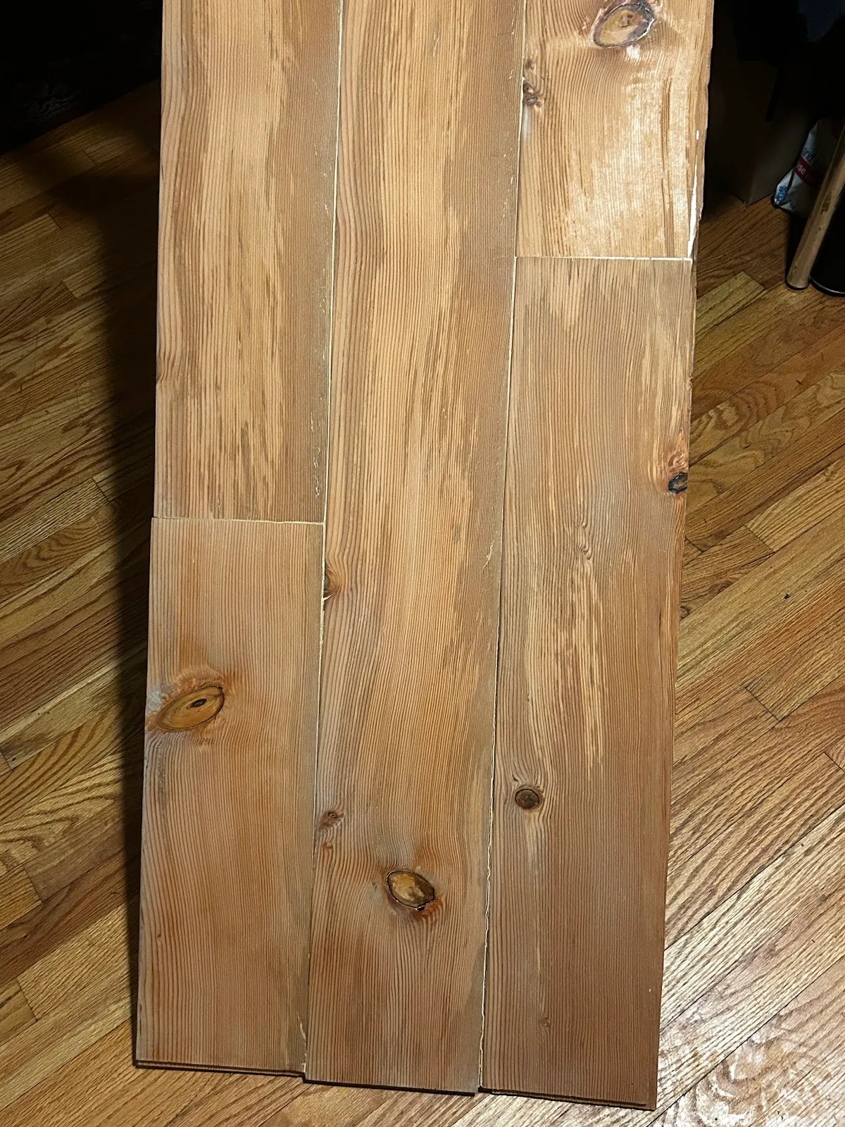 Close view of a small reclaimed sample board and its grain