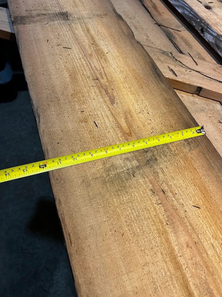 Reclaimed heart pine board showing its grain and width