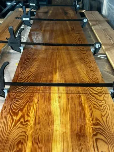 Reclaimed wood being prepared for custom furniture